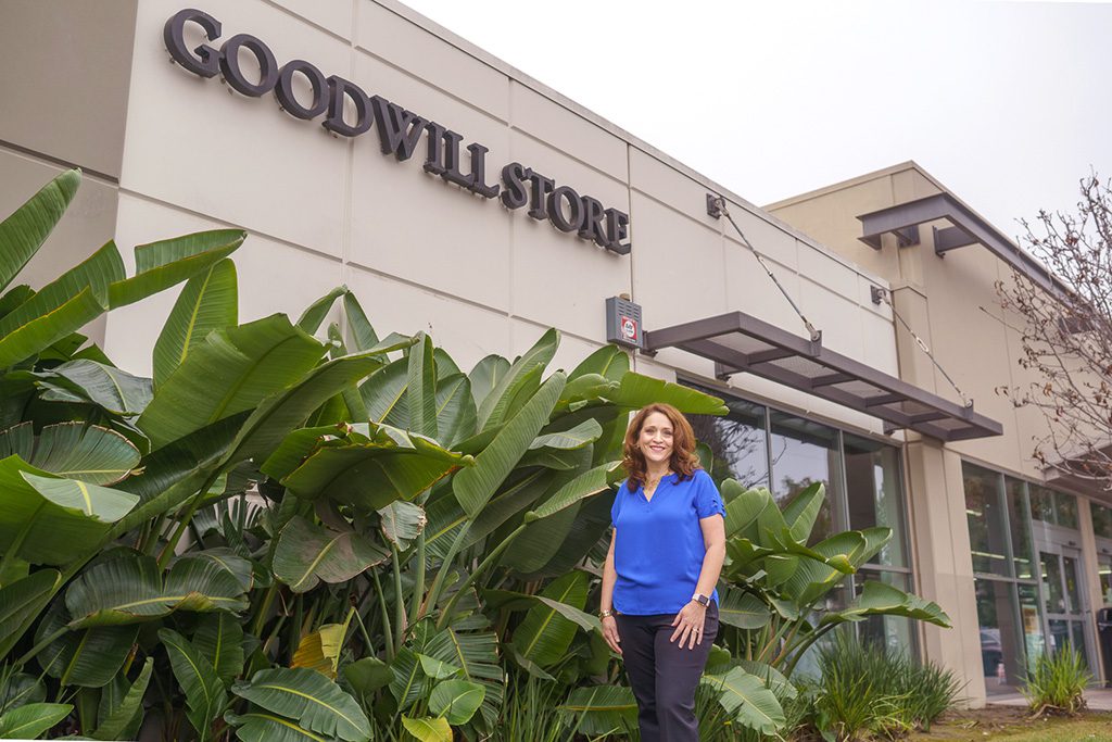 Nicole Suydam stands in front of Goodwill of Orange County