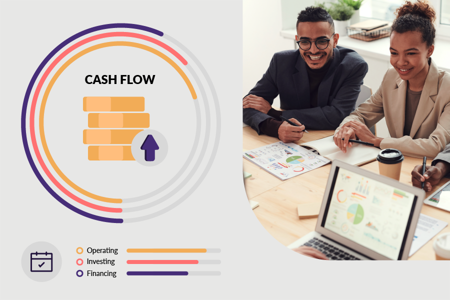 African American business partners smiling while preparing cash flow statements