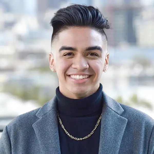 Roberto Robles profile picture with blurred out Los Angeles skyline in the background