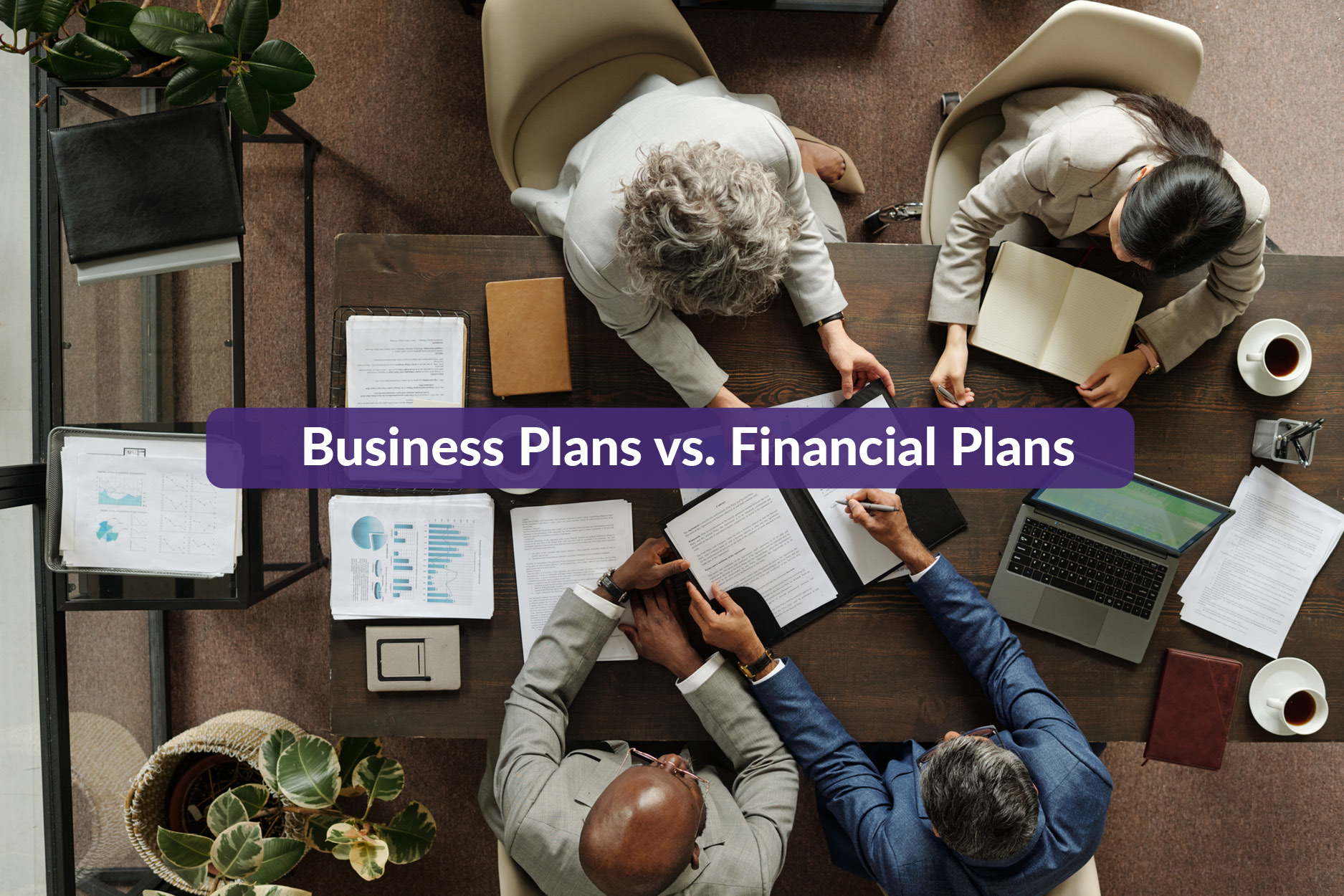 Group of diverse business partners conversing about business and financial plans